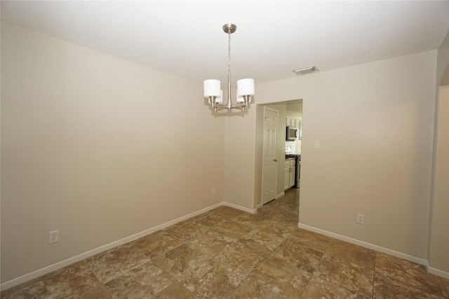 2434 Ranch Hollow Ct, Katy, TX 77494 - unfurnished room with a chandelier and stone finish flooring