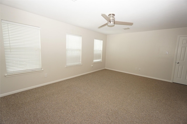 2434 Ranch Hollow Ct, Katy, TX 77494 - carpeted spare room featuring ceiling fan and baseboards
