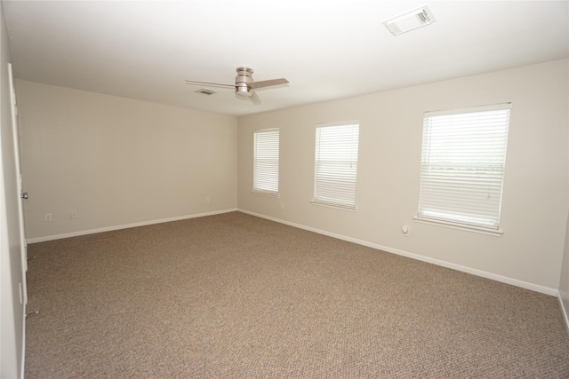 2434 Ranch Hollow Ct, Katy, TX 77494 - spare room with carpet and ceiling fan