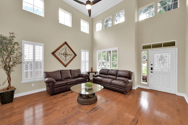 46 Lightwood Trce, The Woodlands, TX 77382 - living area with a high ceiling, hardwood / wood-style floors, and a ceiling fan