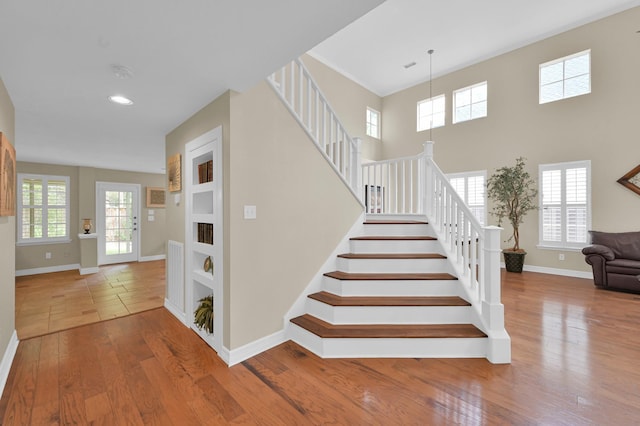 46 Lightwood Trce, The Woodlands, TX 77382 - staircase featuring wood finished floors and recessed lighting