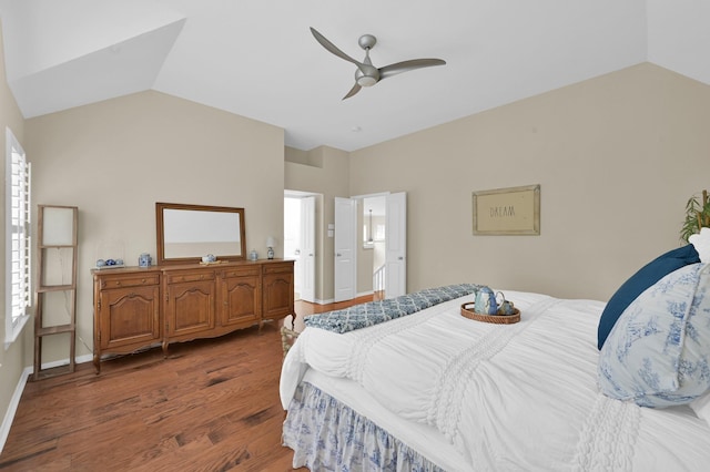 46 Lightwood Trce, The Woodlands, TX 77382 - bedroom with wood finished floors, vaulted ceiling, and ceiling fan