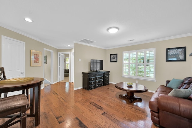 46 Lightwood Trce, The Woodlands, TX 77382 - living room with ornamental molding, wood finished floors, and recessed lighting