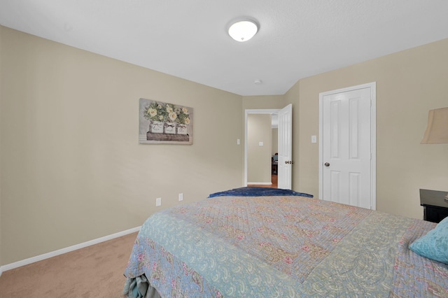 46 Lightwood Trce, The Woodlands, TX 77382 - bedroom featuring carpet floors and baseboards