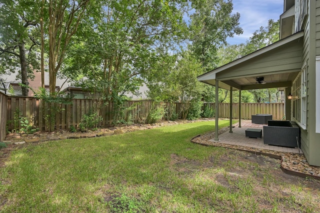 46 Lightwood Trce, The Woodlands, TX 77382 - fenced backyard featuring an outdoor hangout area and a patio area