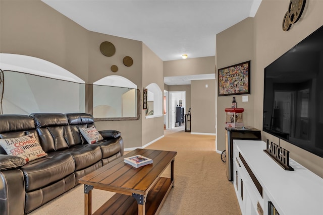 7710 Aerobic Ave, Humble, TX 77346 - living room featuring light carpet and baseboards
