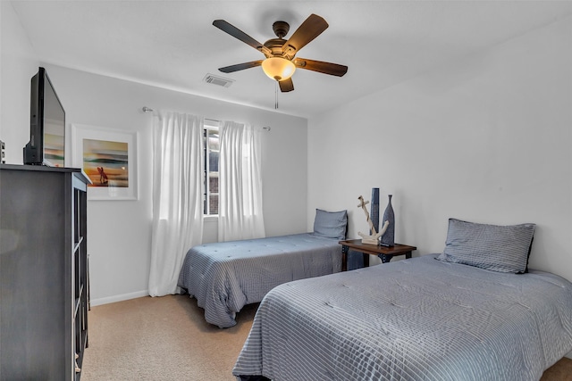 7710 Aerobic Ave, Humble, TX 77346 - carpeted bedroom featuring a ceiling fan and baseboards