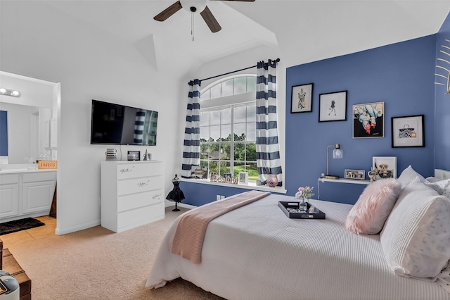 7710 Aerobic Ave, Humble, TX 77346 - carpeted bedroom featuring ensuite bath, vaulted ceiling, and a ceiling fan
