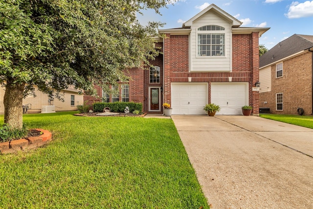 7710 Aerobic Ave, Humble, TX 77346 - traditional home featuring concrete driveway, a front lawn, an attached garage, and brick siding