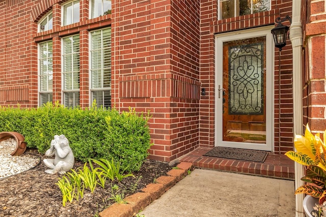 7710 Aerobic Ave, Humble, TX 77346 - doorway to property with brick siding