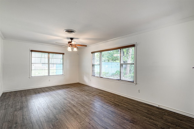 1226 Timbergrove Ln, Houston, TX 77008 - empty room featuring crown molding, dark wood finished floors, and a ceiling fan