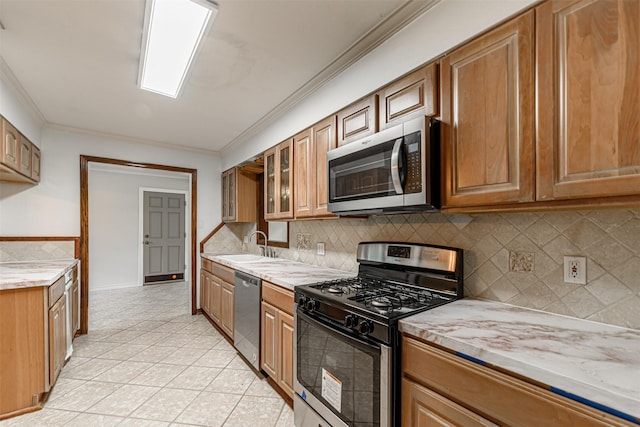 1226 Timbergrove Ln, Houston, TX 77008 - kitchen with stainless steel appliances, light tile patterned floors, crown molding, brown cabinetry, and decorative backsplash