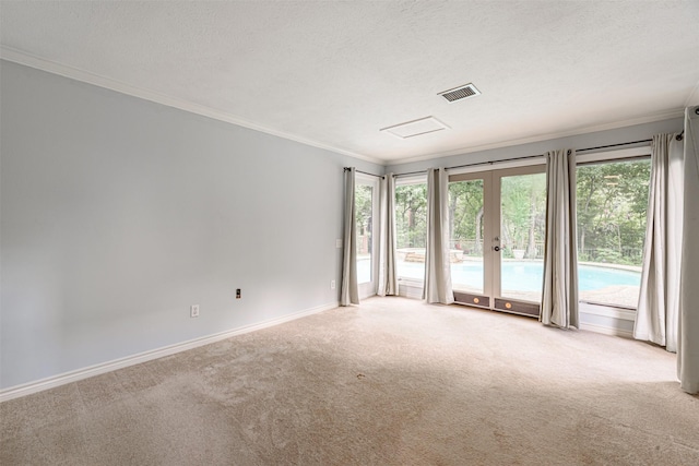 1226 Timbergrove Ln, Houston, TX 77008 - carpeted empty room with french doors, ornamental molding, and a textured ceiling