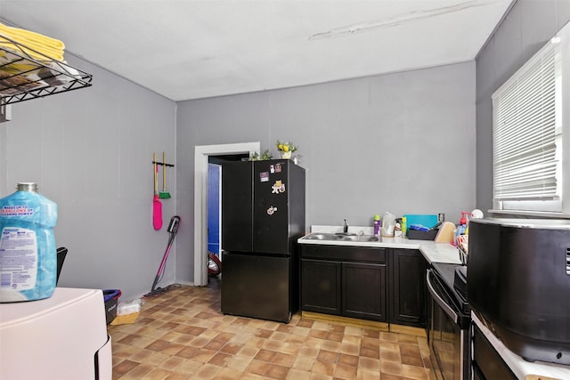 208 S Cloud St, Wharton, TX 77488 - kitchen with black appliances and light countertops