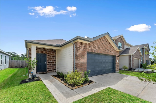 10138 California Lily Ln, Houston, TX 77016 - view of front facade featuring brick siding, a garage, and driveway