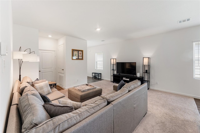 10138 California Lily Ln, Houston, TX 77016 - living room featuring recessed lighting and baseboards