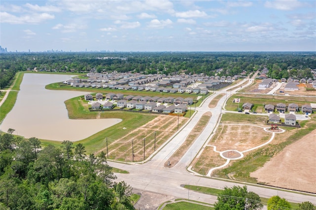 10138 California Lily Ln, Houston, TX 77016 - aerial overview of property's location with nearby suburban area and a nearby body of water