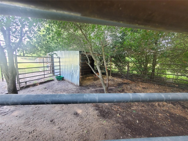 95 Red Tip Ln, Brenham, TX 77833 - view of yard with an exterior structure