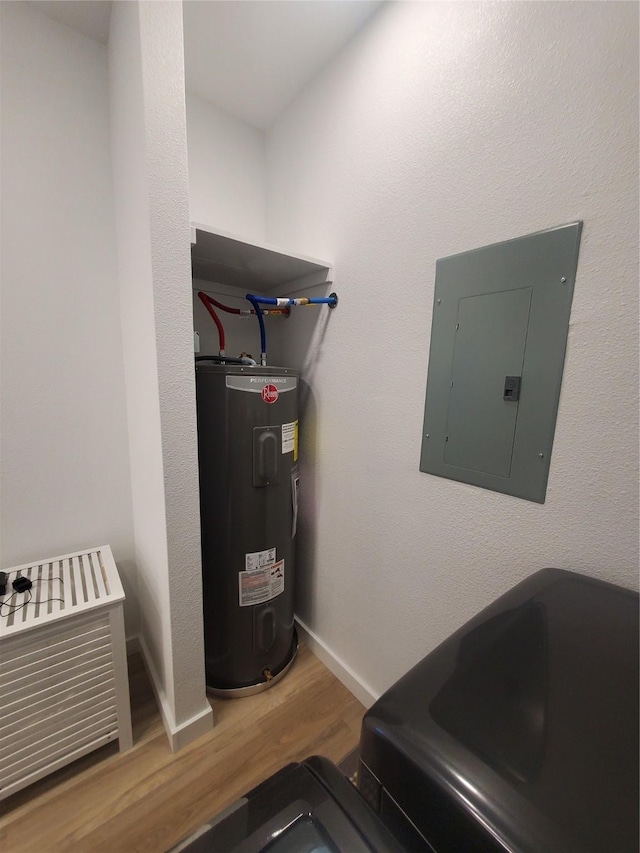 95 Red Tip Ln, Brenham, TX 77833 - utility room with electric water heater and electric panel