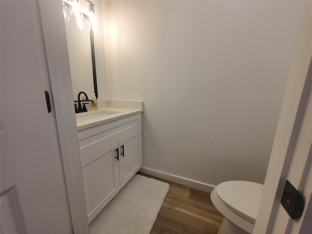 95 Red Tip Ln, Brenham, TX 77833 - bathroom with vanity and wood finished floors