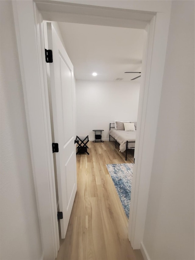 95 Red Tip Ln, Brenham, TX 77833 - corridor featuring light wood-style floors