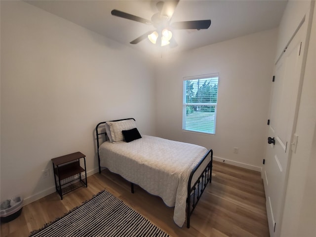 95 Red Tip Ln, Brenham, TX 77833 - bedroom with wood finished floors and ceiling fan