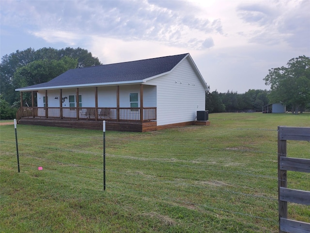 95 Red Tip Ln, Brenham, TX 77833 - view of front of home with a front lawn and a shingled roof