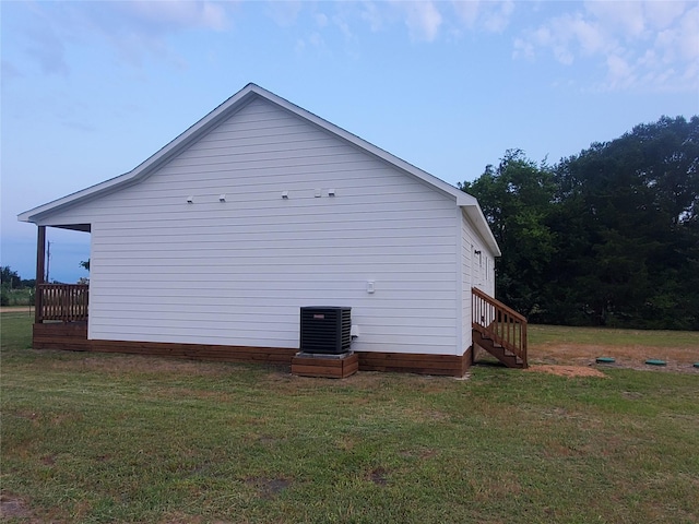95 Red Tip Ln, Brenham, TX 77833 - view of side of property featuring a yard and stairs