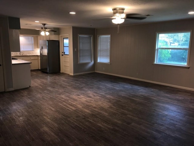 6515 Lindyann Ln, Houston, TX 77008 - unfurnished living room with ceiling fan, dark wood-style flooring, and recessed lighting