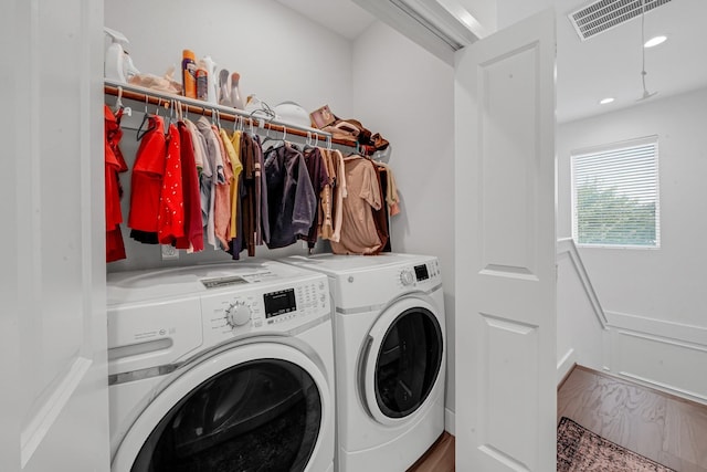 734 W Donovan St, Houston, TX 77091 - washroom with washing machine and dryer, recessed lighting, and marble finish flooring