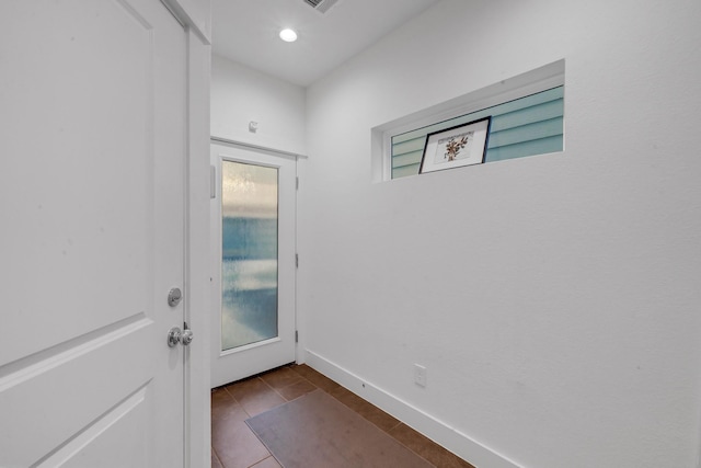 734 W Donovan St, Houston, TX 77091 - entryway with dark tile patterned flooring