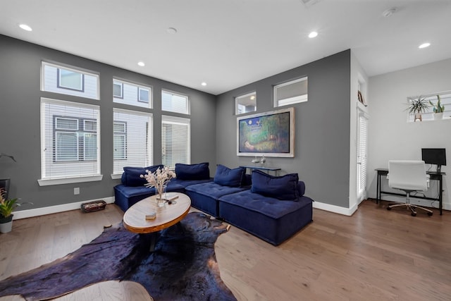 734 W Donovan St, Houston, TX 77091 - living area featuring wood finished floors, recessed lighting, and an office area