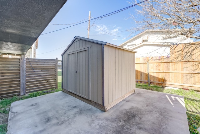 4211 Surf Dr, Galveston, TX 77554 - view of shed featuring a fenced backyard