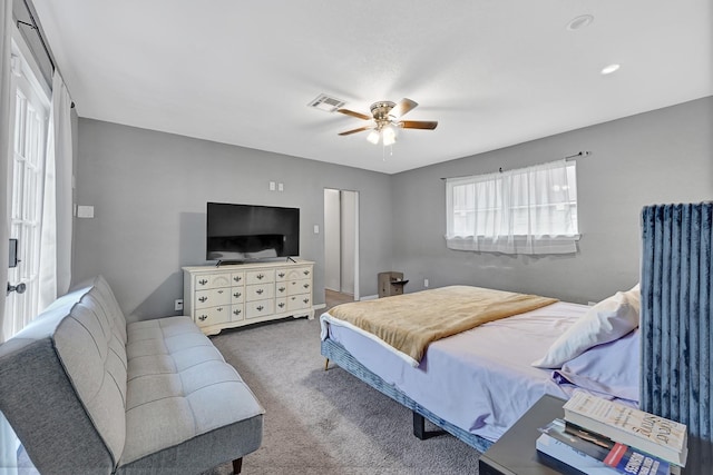 7530 Deep Forest Dr, Houston, TX 77088 - bedroom featuring carpet and ceiling fan