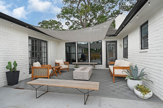 7530 Deep Forest Dr, Houston, TX 77088 - view of patio featuring outdoor lounge area and french doors