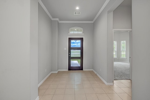 285 Rd 66121, Dayton, TX 77535 - entrance foyer featuring plenty of natural light, light tile patterned floors, and ornamental molding