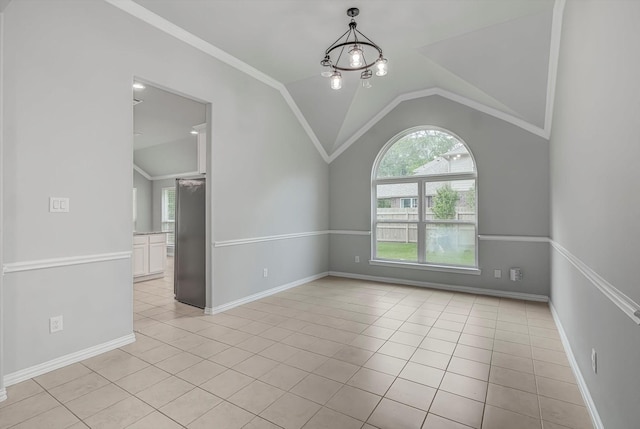 285 Rd 66121, Dayton, TX 77535 - spare room with lofted ceiling, light tile patterned floors, and ornamental molding