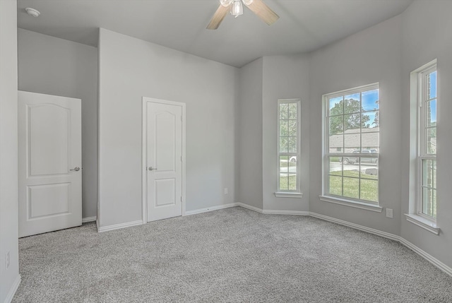 285 Rd 66121, Dayton, TX 77535 - carpeted spare room with a smoke detector and ceiling fan