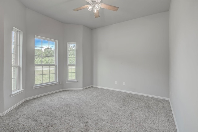 285 Rd 66121, Dayton, TX 77535 - carpeted empty room with baseboards and a ceiling fan