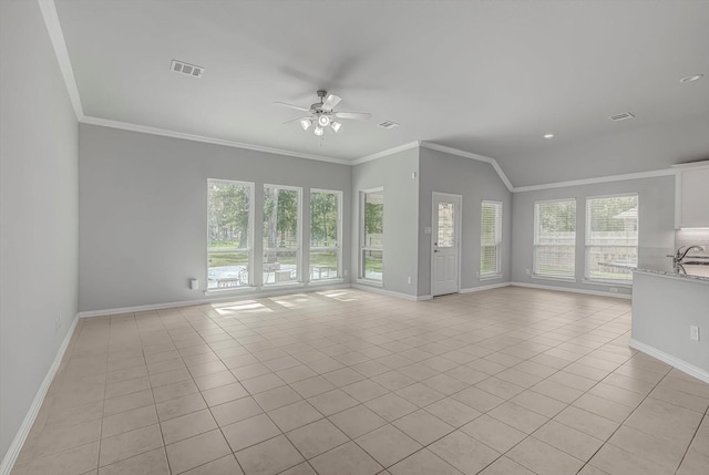 285 Rd 66121, Dayton, TX 77535 - unfurnished living room with a ceiling fan, light tile patterned floors, crown molding, and vaulted ceiling