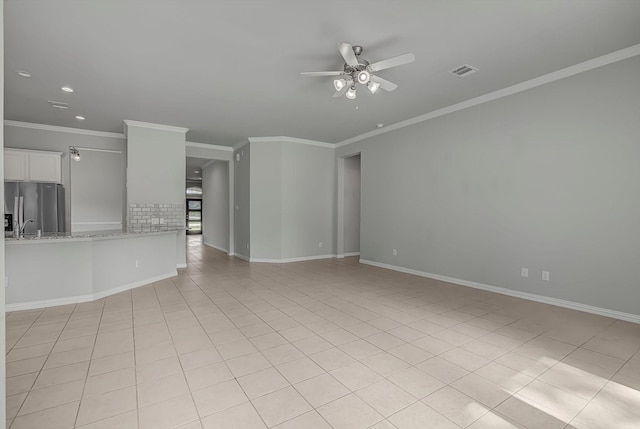 285 Rd 66121, Dayton, TX 77535 - unfurnished living room featuring a ceiling fan, light tile patterned floors, crown molding, and recessed lighting