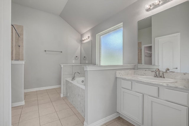 285 Rd 66121, Dayton, TX 77535 - full bathroom with lofted ceiling, a bath, tile patterned floors, vanity, and a tile shower