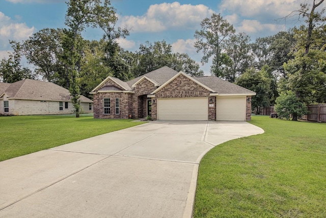 285 Rd 66121, Dayton, TX 77535 - view of front of home with brick siding, an attached garage, and concrete driveway