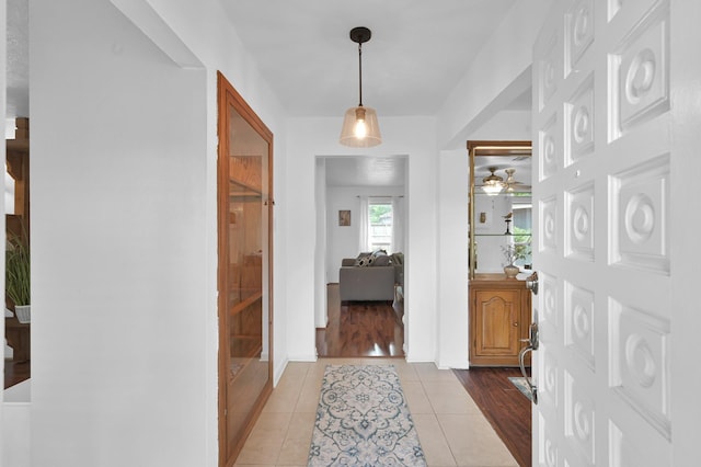 27237 Lana Ln, Conroe, TX 77385 - foyer with light tile patterned floors and ceiling fan