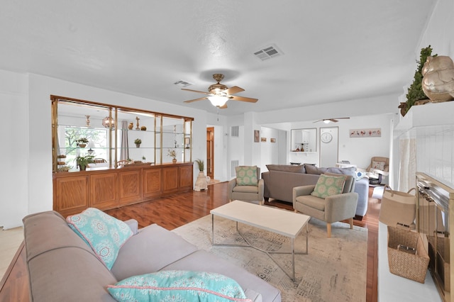 27237 Lana Ln, Conroe, TX 77385 - living area featuring a ceiling fan and light wood-type flooring
