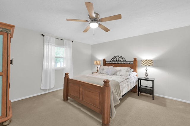 27237 Lana Ln, Conroe, TX 77385 - bedroom with light carpet and ceiling fan
