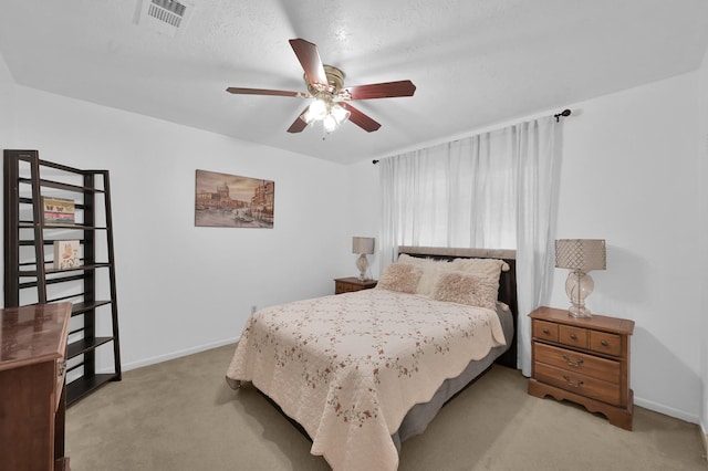 27237 Lana Ln, Conroe, TX 77385 - carpeted bedroom featuring baseboards and a ceiling fan