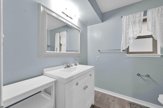 27237 Lana Ln, Conroe, TX 77385 - bathroom with vanity and wood finished floors