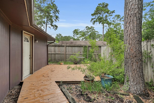 27237 Lana Ln, Conroe, TX 77385 - wooden deck featuring a fenced backyard