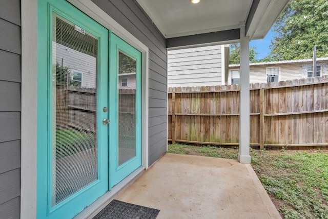 16850 Glenheath, Montgomery, TX 77316 - entrance to property featuring french doors and a patio